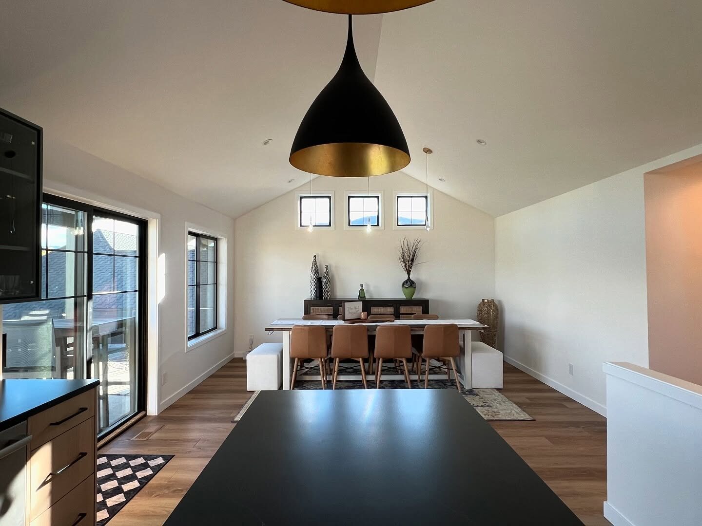 Painted dining room with a pendant light