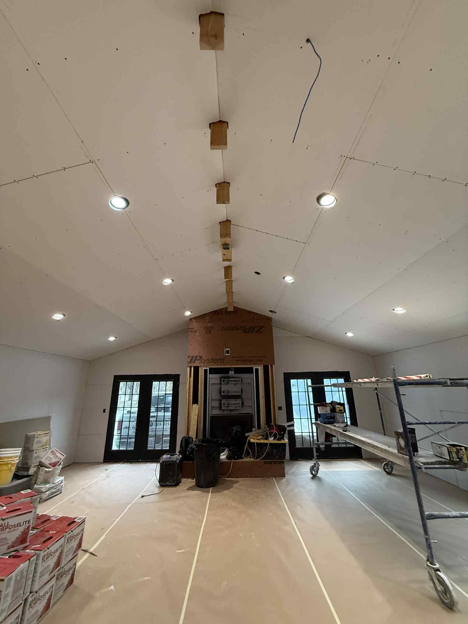 Taped and finished vaulted drywall ceiling